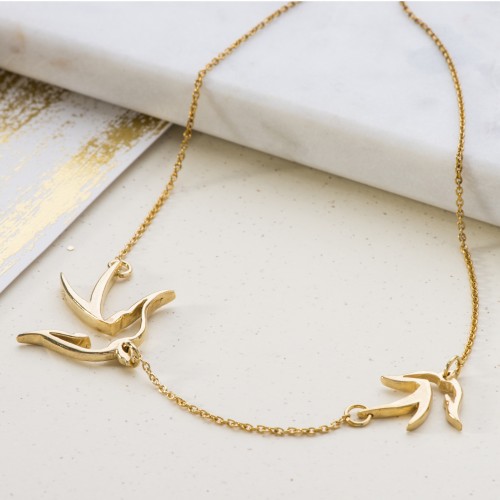 Double bird necklace symbolising mother and child