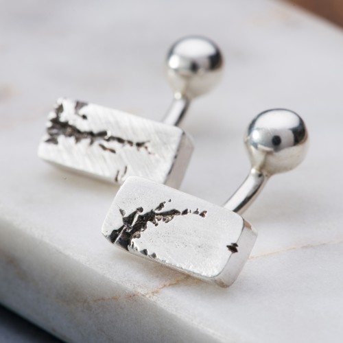 Heavy rectangle silver cufflinks with rip detail