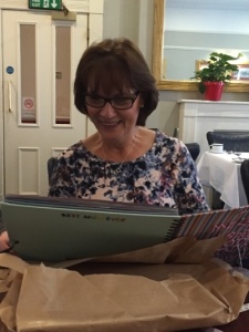 Mum reading her Scrap book of memories over the years #makeagiftday