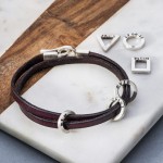 Leather and silver men's bracelet with charms