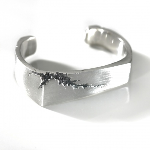 Gorgeous men's cuff in solid sterling silver with blackened ripped detail and satin finish