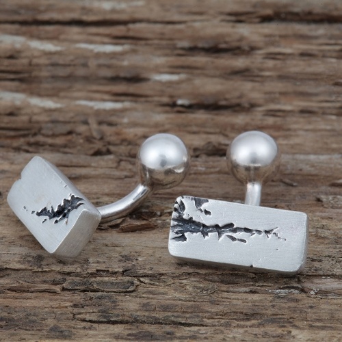 Rectangle silver cufflinks with blackened rip detail